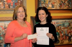 Billeaud Treasurer Peggy Voorhies presents ACA Foundation Contribution